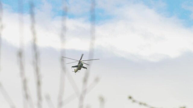 Military helicopter in the air. Helicopter slow motion close-up footage.