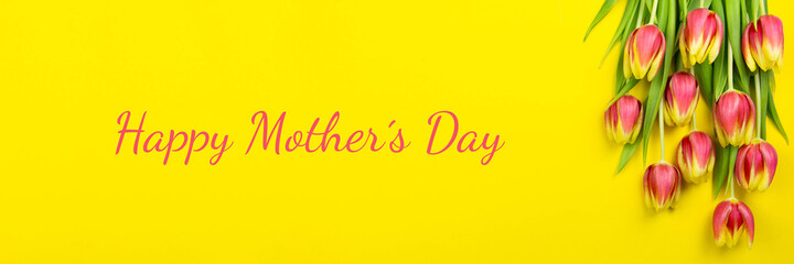 Fototapeta premium Happy Mothers day banner flat lay with red tulip on yellow background. Top view on tender spring flowers. Copy space.
