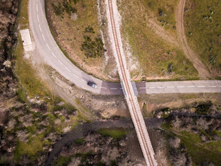 Road, railway and stream in park in Corsica