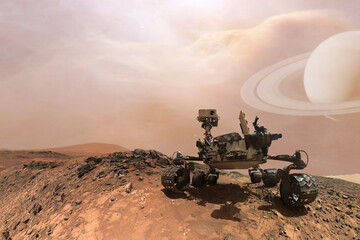 Curiosity Mars Rover exploring the surface of red planet. Elements of this image furnished by NASA.