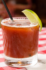 blood mary glass on italian canteen table
