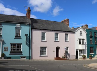 Fototapeta na wymiar Fishguard Street View with Blue and Pink Houses in Pembrokeshire, Wales, UK