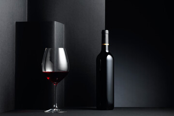 Red wine on a black background.