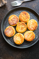 cheesecake breakfast syrniki dessert curd cottage cheese pancakes healthy meal top view copy space rustic food background image