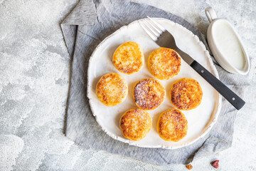 cheesecake breakfast syrniki dessert curd cottage cheese pancakes healthy meal top view copy space rustic food background image