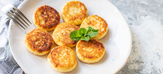 cheesecake breakfast syrniki dessert curd cottage cheese pancakes healthy meal top view copy space rustic food background image