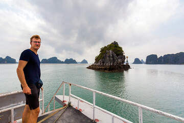 Man in Bai Tu Long Bay cruise Halong Vietnam