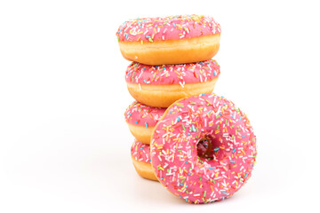 Fresh made Donuts isolated on white background. Doughnuts are traditional sweet pastries. Copy space for text.