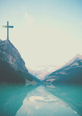 Background for lent season. Cross in the mountains
