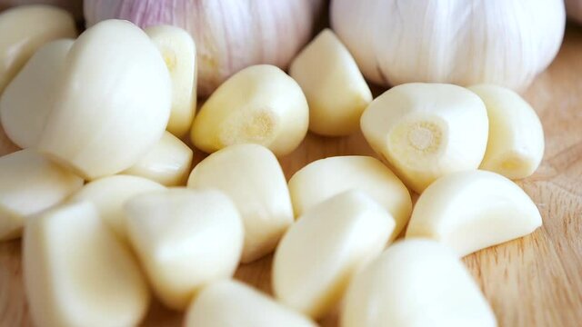 Top view of close up garlic on wooden table