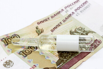 Vaccine in an ampoule and Russian money
