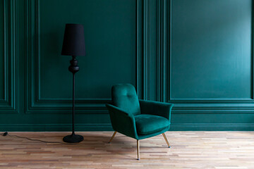 Beautiful luxury classic blue green clean interior room in classic style with green soft armchair. Vintage antique blue-green chair standing beside emerald wall. Minimalist home design. - obrazy, fototapety, plakaty