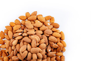 Almond. Pile Almond on white background. Heap of almond isolated on white.