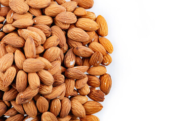 Almond Nuts Isolated On White Background Close Up. Pile Almond on white background. Heap of almond isolated on white.