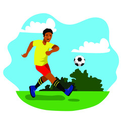 Soccer player in sports uniform kicking a football. Look so happy. Blue sky in the background. It’s fit for promoting man sport, active and healthy lifestyle.