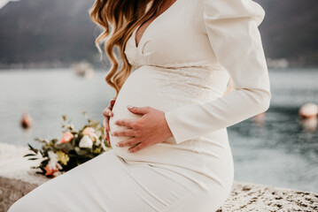 romantic wedding pregnant baby expecting hads on babybump