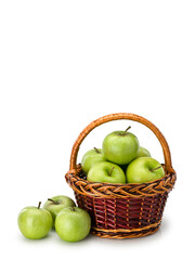 Green apples in wattle basket