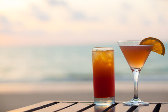 Exotic Cocktails on a Beach in Sunset Light. Thailand