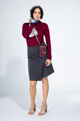 Fototapeta premium Young white girl on light grey