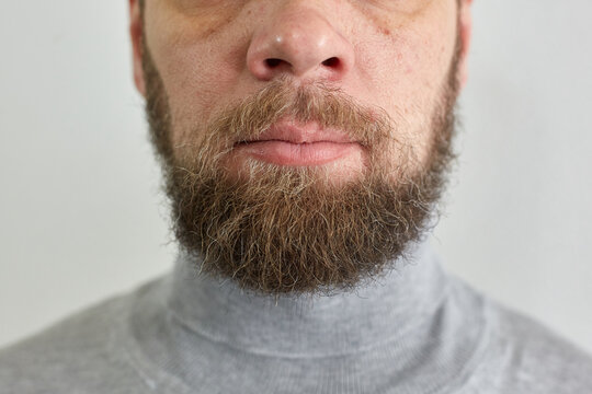 male short beard, portrait of a middle-aged man, male lips and nose