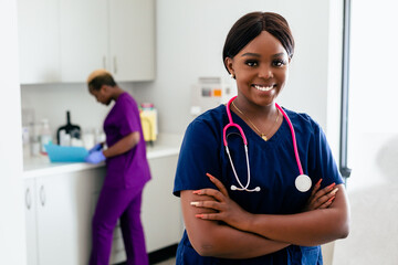 Portrait of Black female nurse with scrubs and stethoscope