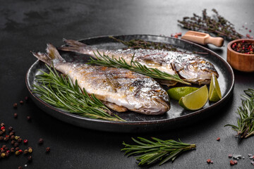 Delicious dorado baked on a grill with spices and herbs. Dorado cooked on about