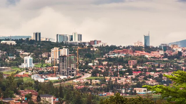 Timelapse video of Kigali city skyline and surrounding areas, showing movement of clouds and traffic, Rwanda