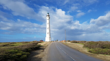  lighthouse in Aruba on a partly cloudy day