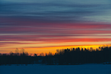 Morning sky above a field at Toten, Norway, in winter.