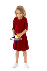 Girl standing with tennis racket. Studio portrait.
