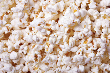 Home made popcorn on a yellow background