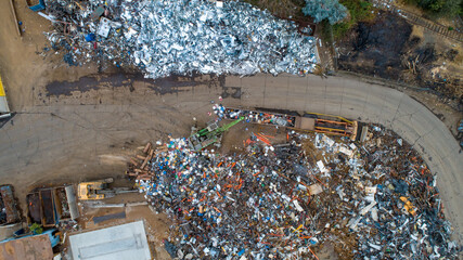 Aerial images of a metal scrap and recycling yard.