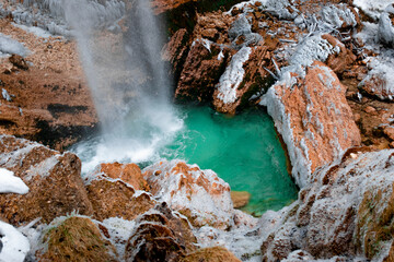 Geothermal winter waterfal in the mountains