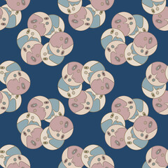 Seamless abstract vector pattern with talisman moons in pastel colors on blue background