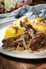 Fried liver with onion.
