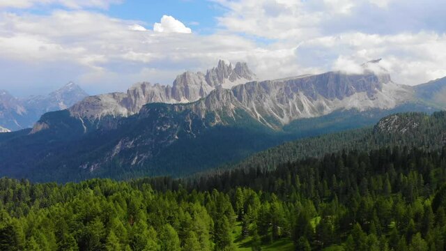 Aerial view Italian Dolomites. Sumer in Dolomiti Dolomites Mountains. Mountain forest in Italian Alps. Croda Da Lago Ridge in Dolomites Mountains. Drone video in beautiful Italian Dolomites Mountains