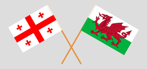 Crossed flags of Georgia and Wales. Official colors. Correct proportion