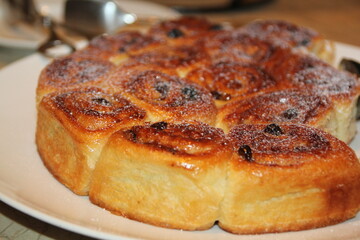 Fresh cinnamon and sugar with raisin bread rolls