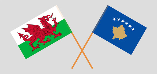 Crossed flags of Wales and Kosovo. Official colors. Correct proportion