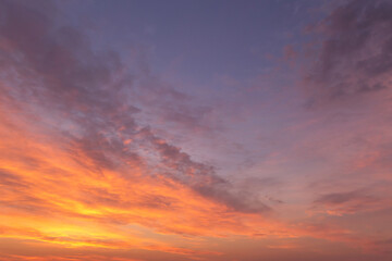 Naklejka na ściany i meble Sunrise, sunset pink blue orange sky in sunlight with cirrus clouds background texture 