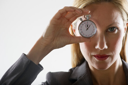 Woman holding a stopwatch
