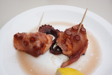 Baked octopus Spanish tapas