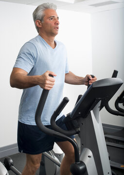 Man Exercising On Stairmaster