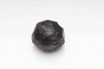 Natural stone garnet on white background