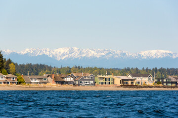 USA, Washington State. Waterfront homes Point Monroe, Bainbridge Island in Port Madison Bay....