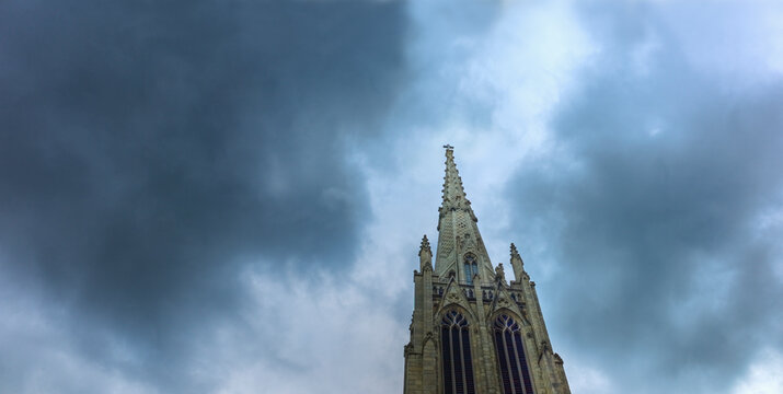 Dark clouds over steeple on Grace Church