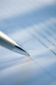 Pen and legal document