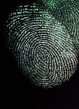 Close up of fingerprint on black background