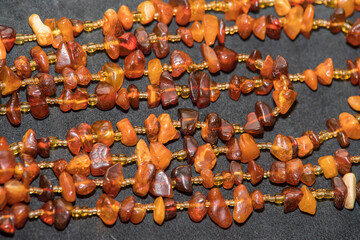 Jewelry made of natural amber stones. Selective focus.