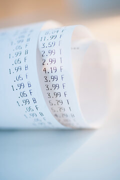 Rolled up receipts with prices